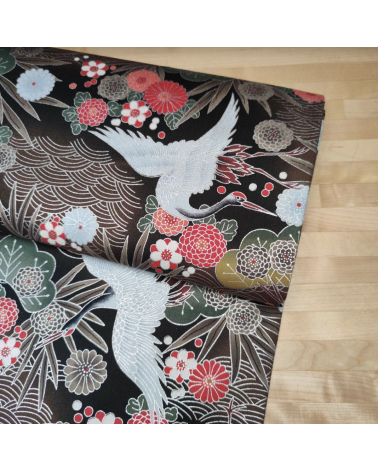 Japanese fabric of cranes in brown and black with silver details.