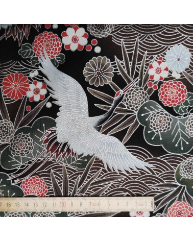 Japanese fabric of cranes in brown and black with silver details.