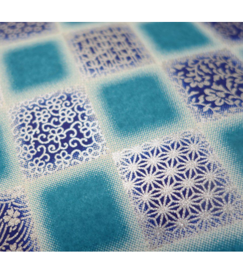 Papel japonés Chiyogami cuadrados con motivos tradicionales sobre fondo azul