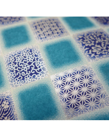 Papel japonés Chiyogami cuadrados con motivos tradicionales sobre fondo azul