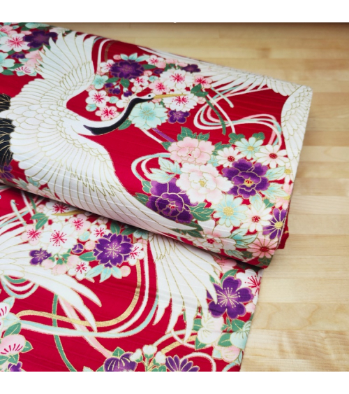 Japanese satin cotton fabric "Cranes XL" over red.