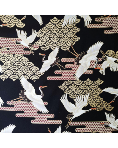 Japanese fabric. Flying Cranes and Clouds over black.