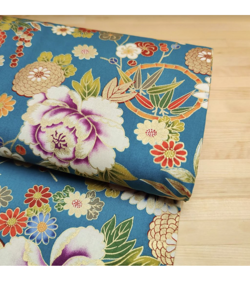 Japanese cotton fabric 'Flowers and bamboo' in retro turquoise blue.
