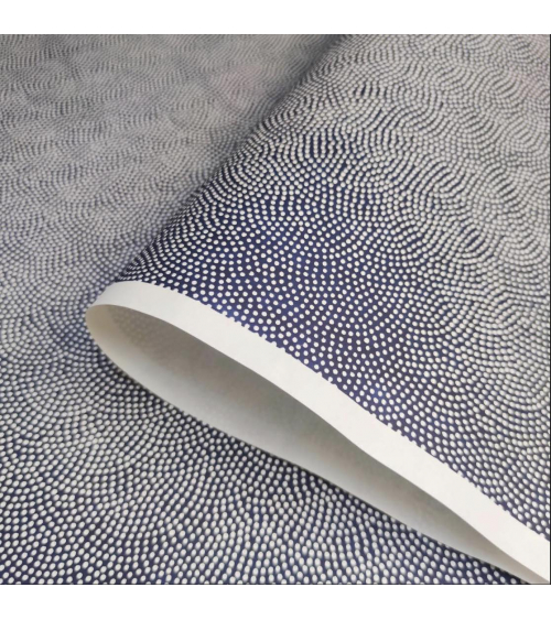 Japanese Chiyogami paper with dotted samekomon on a navy blue background.