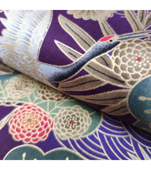Tela japonesa de algodón de grullas en violeta con detalles en oro