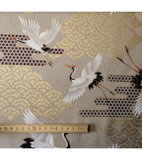 Japanese fabric. Flying Cranes and Clouds over tan.