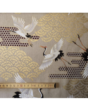 Japanese fabric. Flying Cranes and Clouds over tan.