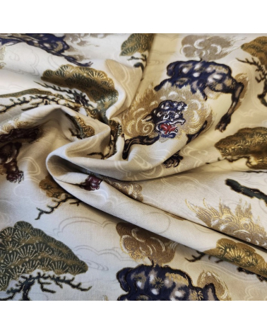 Japanese cotton fabric 'Sishi to matsu' in ivory.