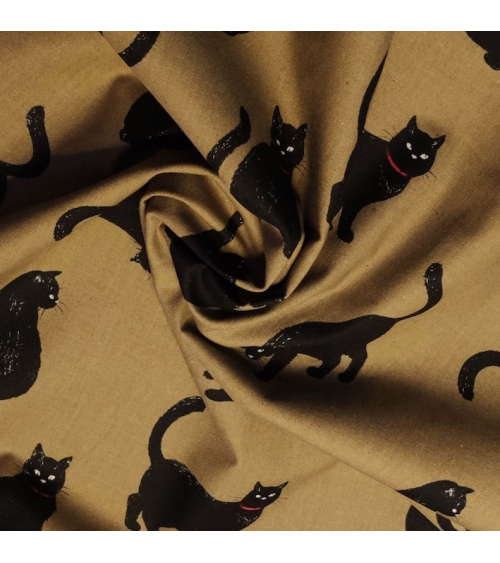 Japanese Fabric 'Cats' over kaki green background.