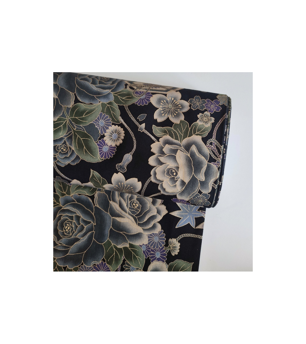 Japanese cotton fabric. Bluish roses over black.
