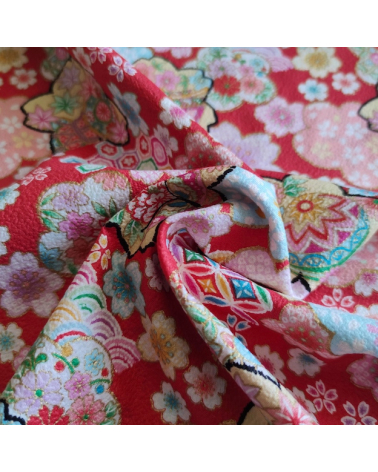 Tela Japonesa fantasía floral roja en chirimen de algodón.