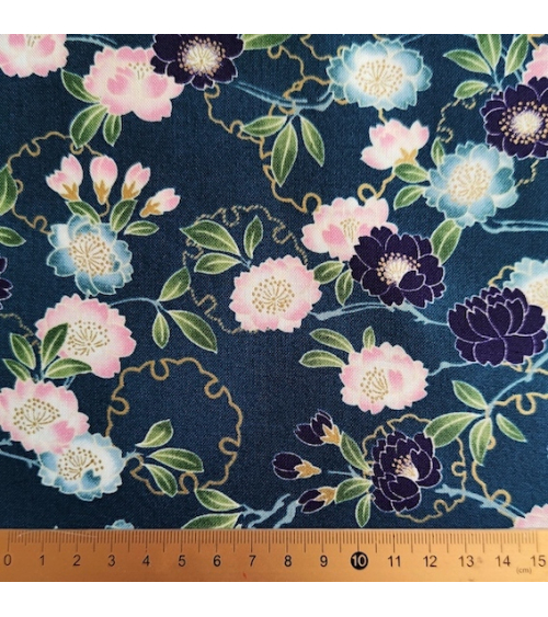 Japanese fabric. 'Yaezakura to yuki' with teal blue background.