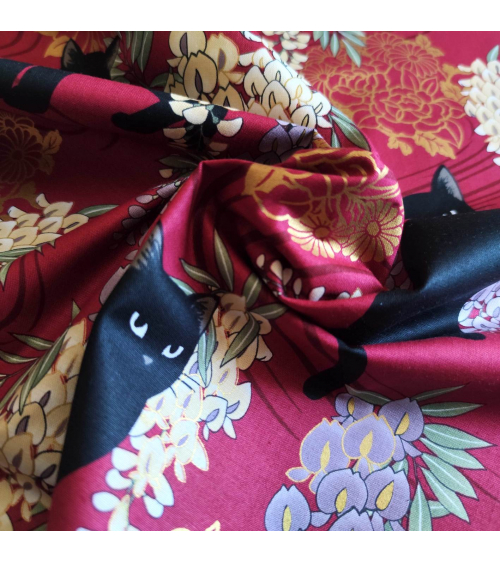 Japanese fabric. Black cats with Wisteria. Red background
