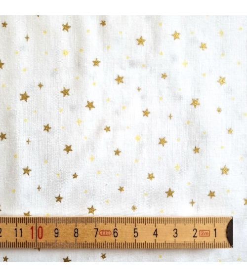 Japanese fabric with golden stars on a white background