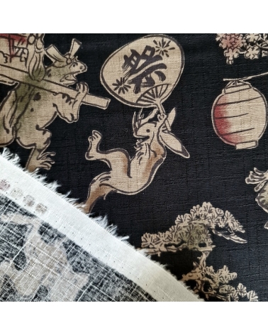 Japanese fabric "Choju-giga" with black background, in 100% cotton dobby.