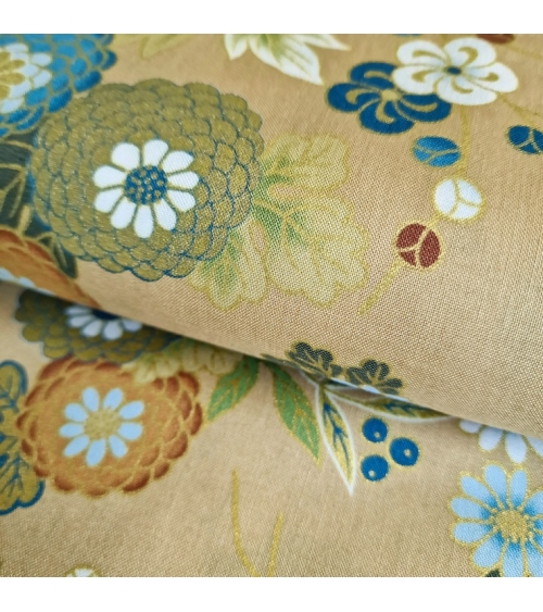 Japanese fabric 'Flowers and bamboo' in bluish colours on tan.