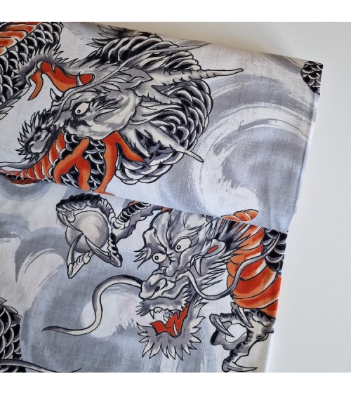 Japanese dobby fabric with large dragons in white.