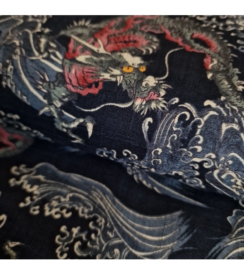 Japanese dobby fabric with small dragons and waves in black.