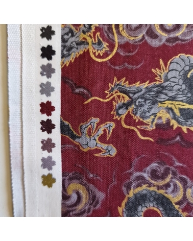 Japanese fabric 'Flying dragons' in burgundy red. 100% cotton.