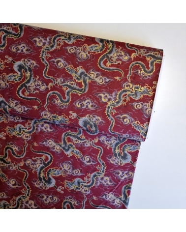 Japanese fabric 'Flying dragons' in burgundy red. 100% cotton.