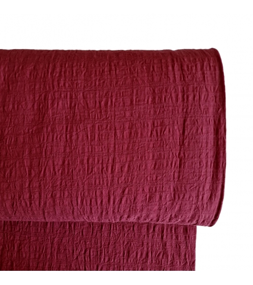 Japanese dobby crumpled fabric in cherry red.